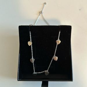Silver heart necklace. Never worn.